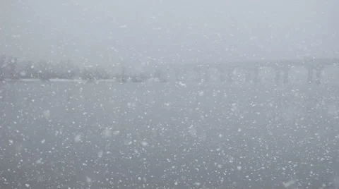 Snowfall on the river Stock Footage 57708745