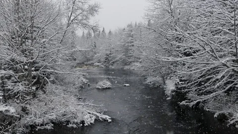 Snowfall on a River Stock Footage 71841583