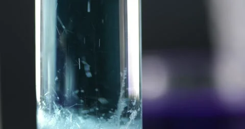 Snowfall Simulation in Glass Test Tube, Weather Conditions Modeling in Stock Footage 322602715