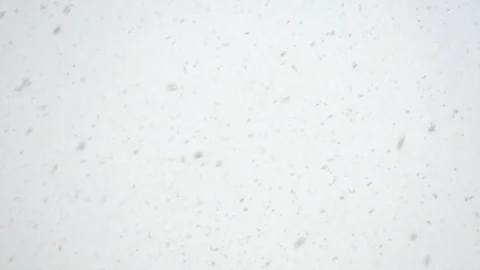 Snowfall slow motion against the sky. 動画素材 117896229