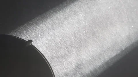 Snowfall in spotlight. Searchlight beam closeup. Small particles in a beam of Stock Footage 259849095