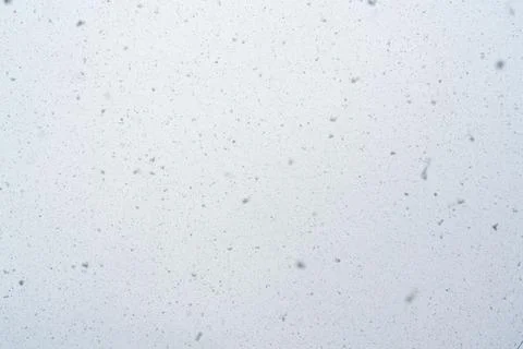 Snowfall texture snowflakes on blurred background weather design Stock Photos