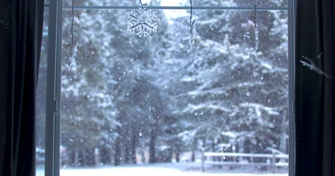 Snowfall Through a Window Stock Footage 100794571