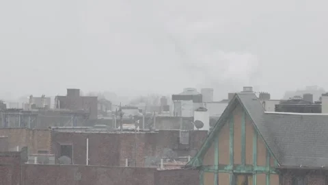 Snowfall in an urban environment Stock Footage 296029603