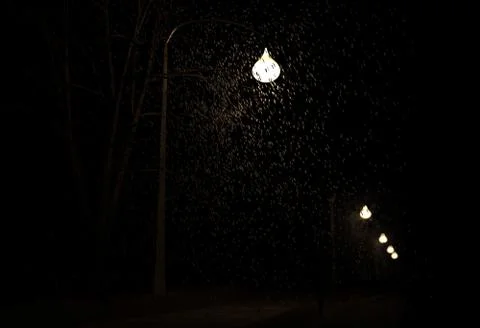 Snowfall in valley of lamp at night 3d illustration Stock Illustration