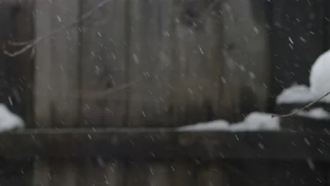 Snowfall view from the window of a country house, cloudy winter weather Stock Footage 168076252