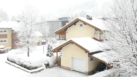 Snowfall in village Stock Footage 97393749