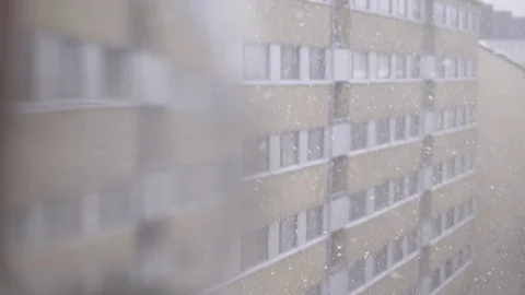 Snowfall from window in Helsinki Video stock 84066412