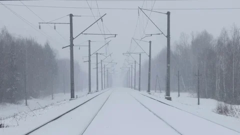 Snowfall in winter on the railway. Stock Footage 80990494