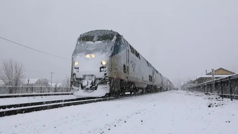 Snowfalling on Amtrak Train Stock Footage 103397929