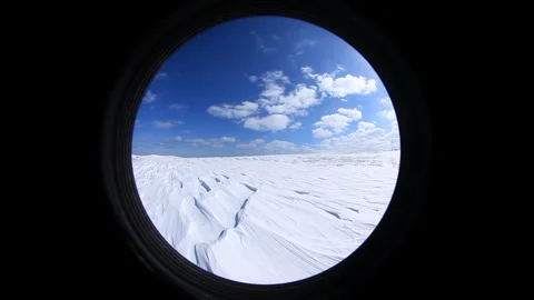 Snowfield Wind Patterns and Sunbeams, Fisheye Stock Footage 324960853