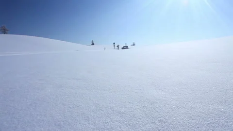 Snowfields, Groves, Cottages, and Rays of Sunlight Stock-Footage 324963455