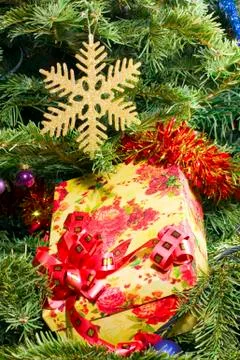 Snowflake and gift box Stock Photos