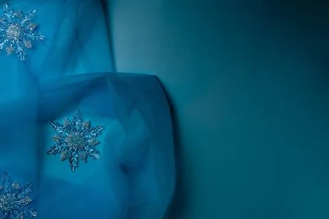Snowflake on a blue background Stock Photos