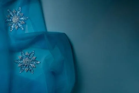 Snowflake on a blue background Stock Photos