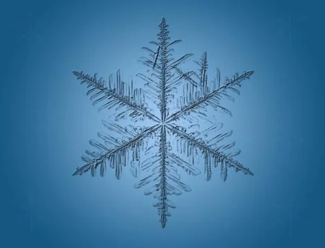 Snowflake on blue Stock Photos