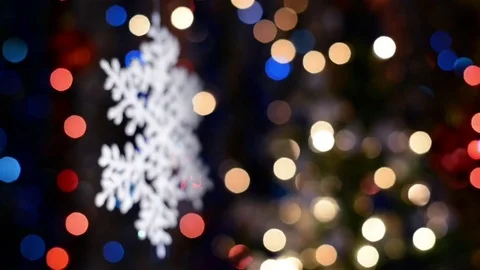 Snowflake decorations, bokeh background, out of focus lights Stock Footage 76049206