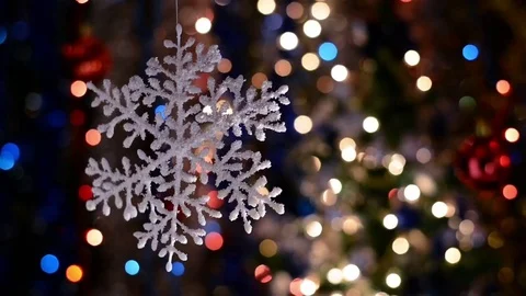 Snowflake decorations, bokeh background, out of focus lights Stock Footage 76050325