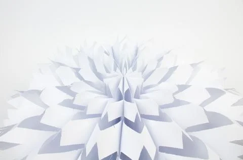 Snowflake made of paper on white background. voluminous. Stock Photos