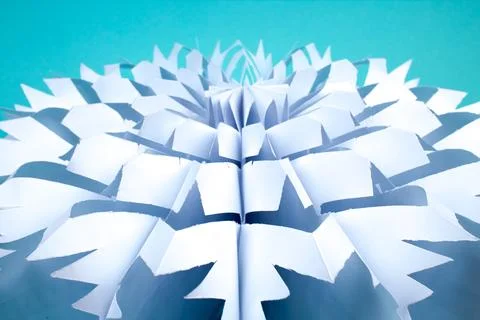 Snowflake made of paper on white background. voluminous. Stock Photos