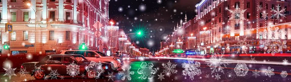 Snowflake New Year winter pattern on blurred defocused background of car nigh Stock Photos