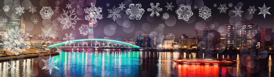 Snowflake New Year winter pattern on blurred defocused background of night il Stock Photos