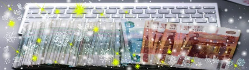 Snowflake New Year winter pattern on blurred defocused background of banknote Stock Photos