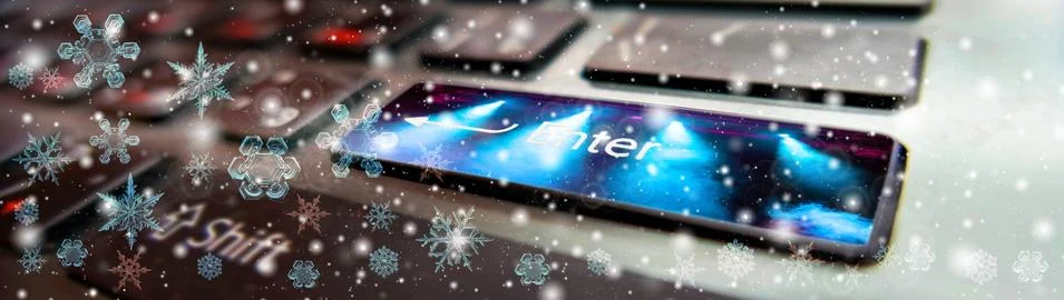 Snowflake New Year winter pattern on blurred defocused background of computer 写真素材