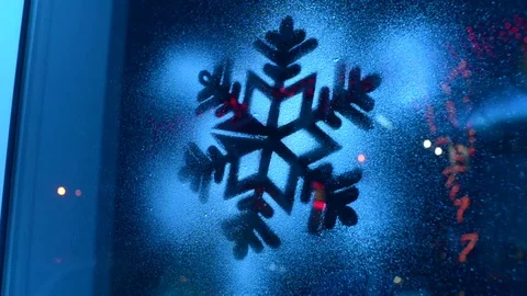 Snowflake painted on the window Stock Footage 70735285