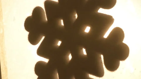 Snowflake shape figure frozen on window in winter Stock Footage 147035974