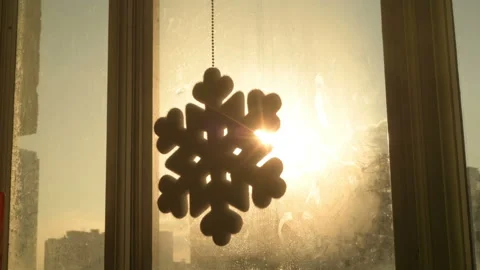 Snowflake shape figure frozen on window in winter Stock Footage 147036337