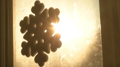 Snowflake shape figure frozen on window in winter Stock Footage 147036364