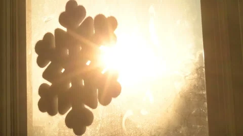 Snowflake shape figure frozen on window in winter Stock Footage 147036395