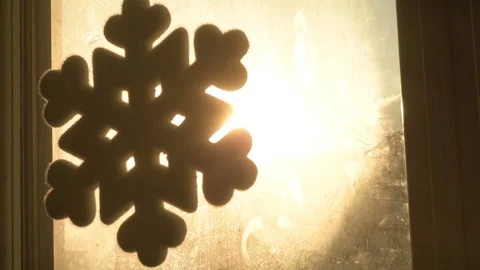 Snowflake shape figure frozen on window in winter Stock Footage 147036528