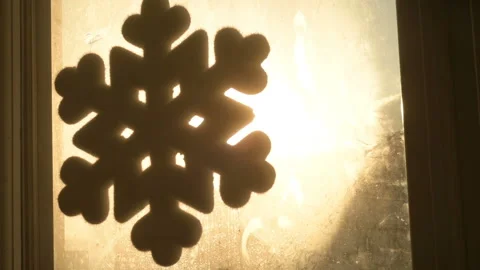 Snowflake shape figure frozen on window in winter Stock Footage 147036569
