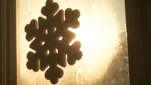 Snowflake shape figure frozen on window in winter Stock Footage 147036585