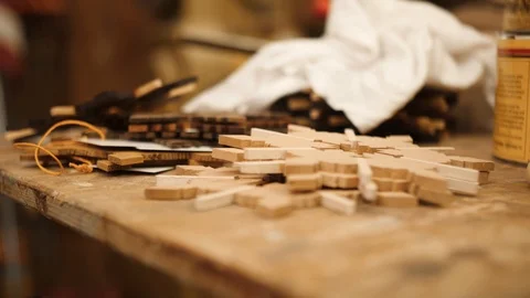 Snowflake woodworking project sitting on table closeup Stock Footage 102045267