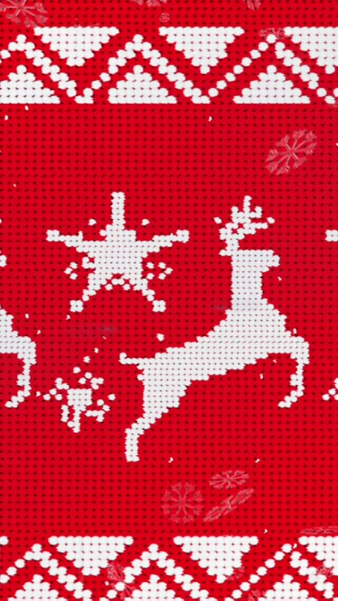 Snowflakes and reindeer pattern celebrate Christmas on red. Stock Footage 342996541