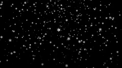 Snowflakes and soft snow particles gracefully falling on a black background Stock Footage 318434922