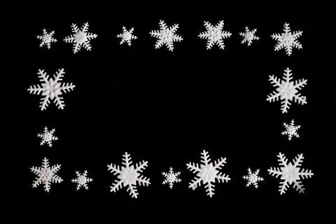 Snowflakes on black background. Background, texture, pattern Stock Photos