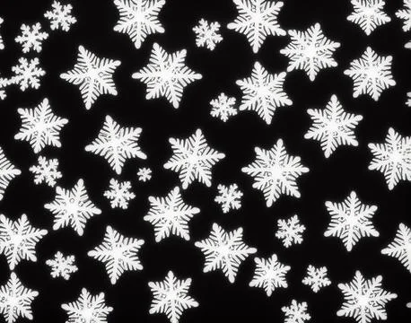 Snowflakes on a black background. Stock Illustration