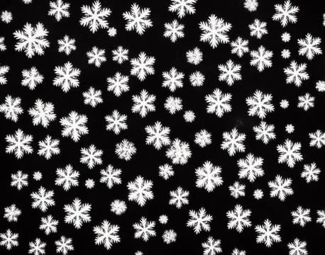 Snowflakes on a black background. Stock Illustration