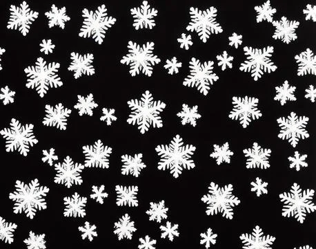 Snowflakes on a black background. Stock Illustration