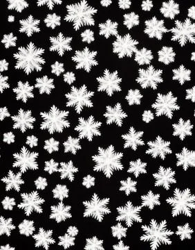 Snowflakes on a black background. Stock Illustration