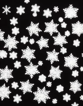 Snowflakes on a black background. Stock Illustration