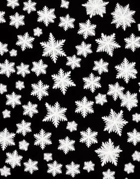 Snowflakes on a black background. Stock Illustration