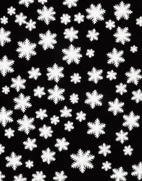 Snowflakes on a black background. Stock Illustration