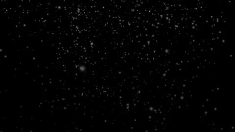 Snowflakes dancing against a dark backdrop, perfect for winter designs. Stock Footage 286407264