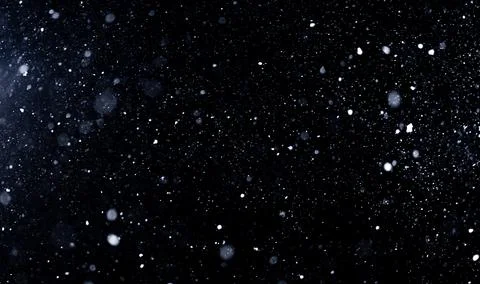 Snowflakes drifting in winter storm wind. Snow overlay background with falling Stock Photos