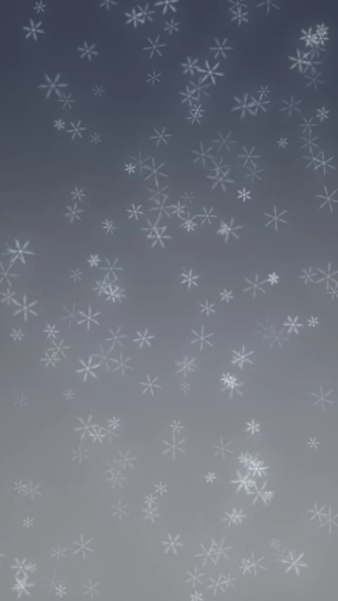 Snowflakes fall across gradient gray, creating serene winter atmosphere Stock Footage 330060140